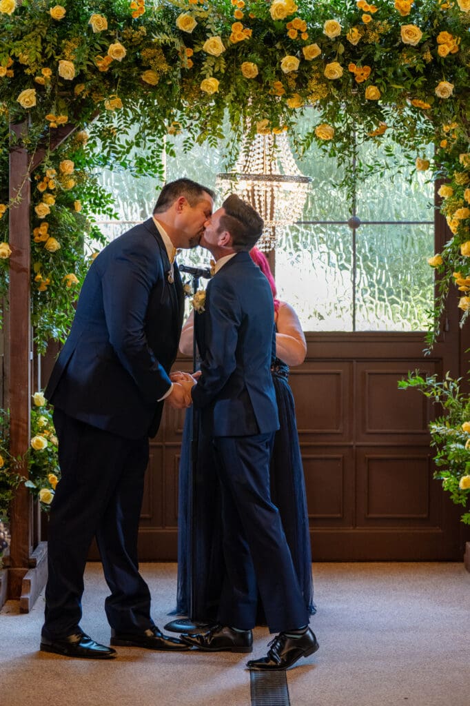 grooms first kiss as husband and husband