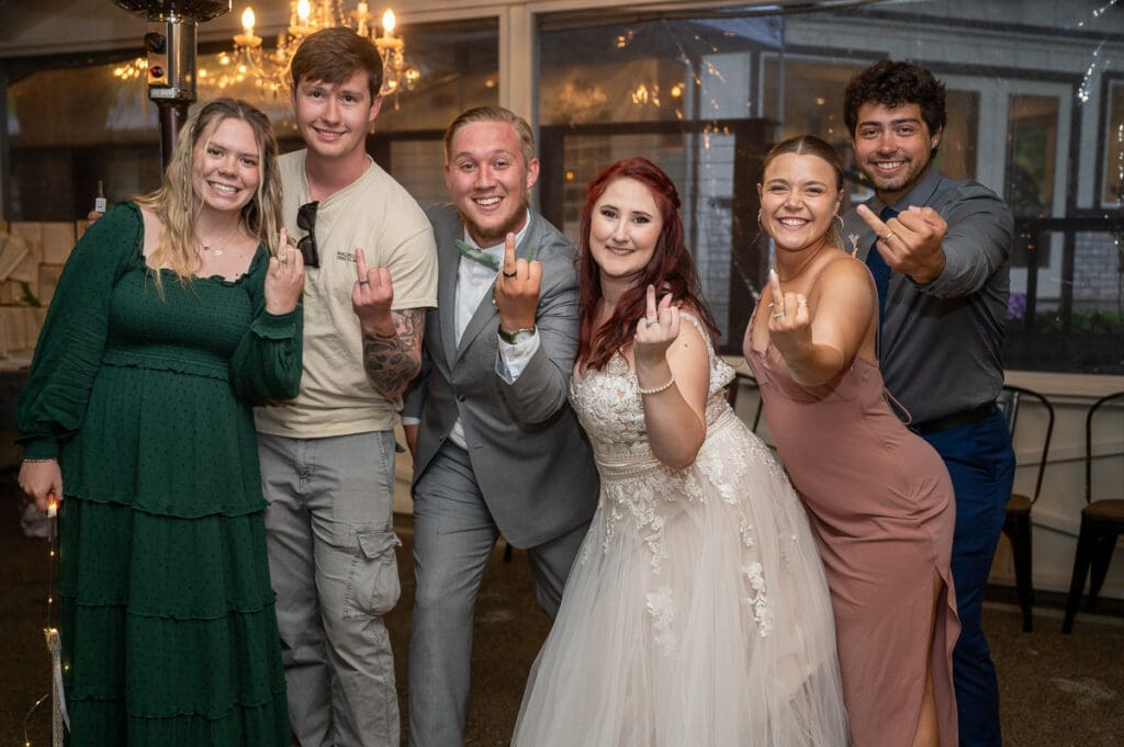 bride and groom with guests